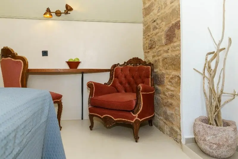 Stone wall detail in economy double room No. 2 in Chios
