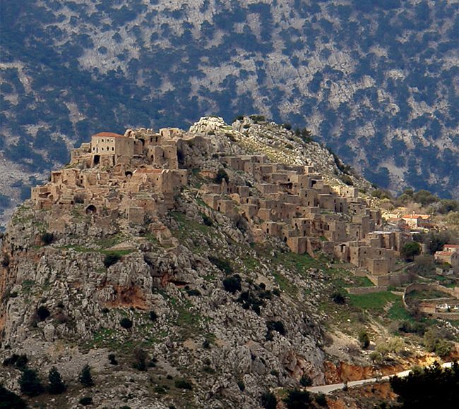 View of Anavatos medieval village in Chios, Greece, perched on a rocky hillside